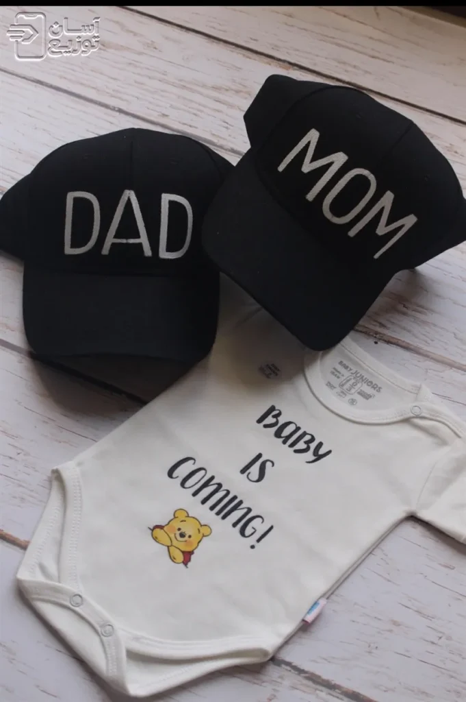 لباس سرهمی نوزاد جونیور طرح BABY IS COMING